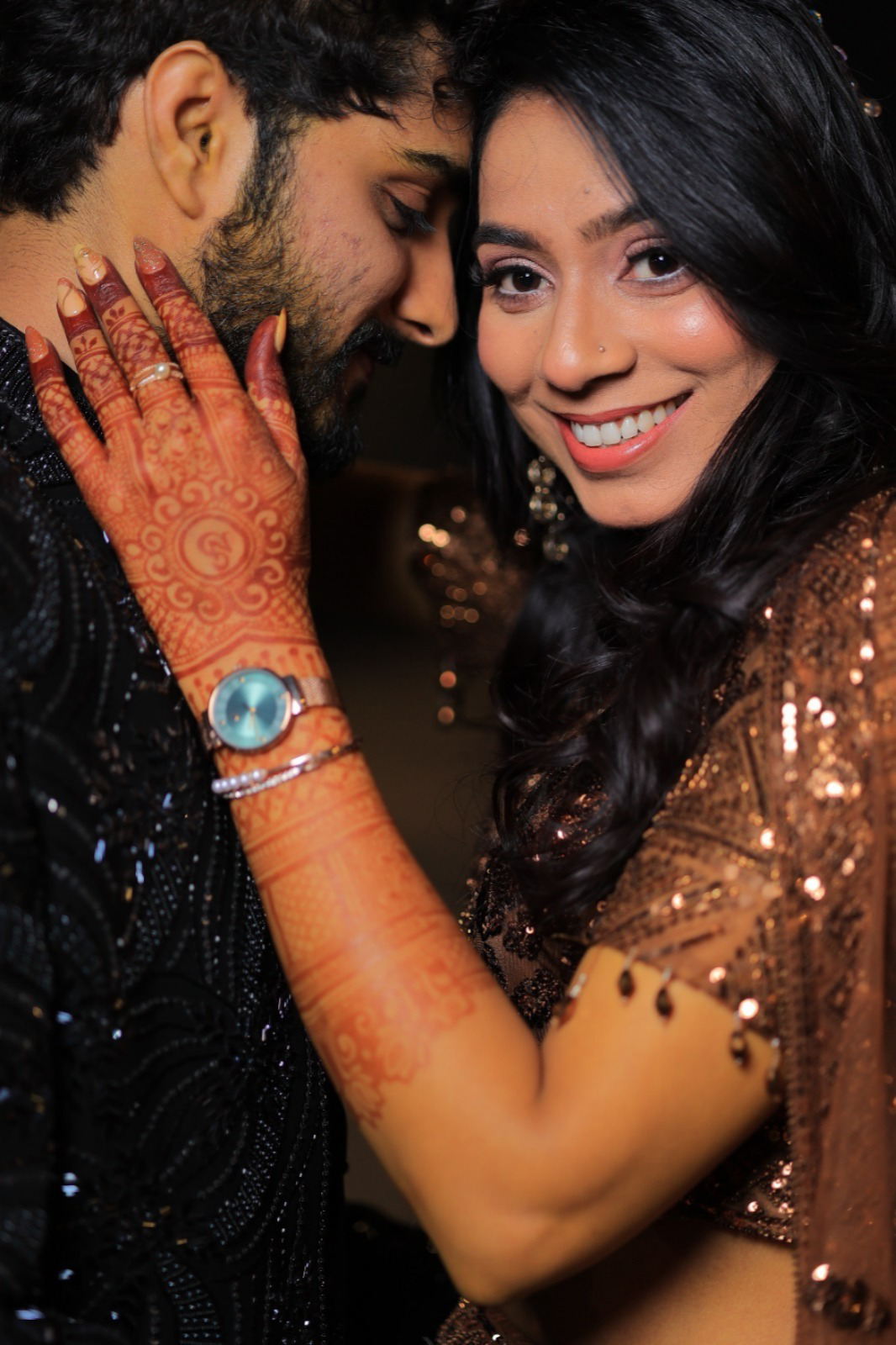 Shobhit and Niya sharing a close wedding portrait